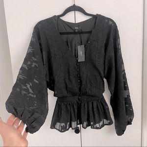 Aeom black long sleeve blouse with semi sheer sleeves, v neck, button detail.